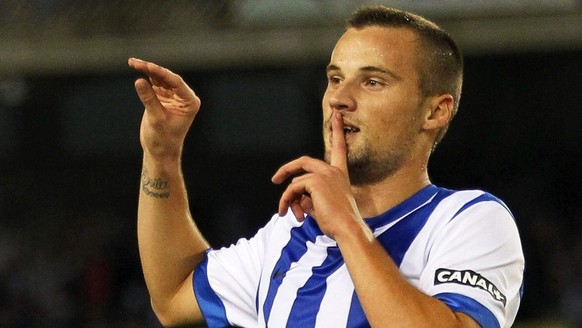 epa03934005 Real Sociedad&#039;s Swiss midfielder Haris Seferovic celebrates after scoring the 5-0 lead during the Spanish Primera Division soccer match between Real Sociedad and CA Osasuna at Anoeta  ...