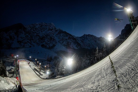 epa08879882 Karl Geiger of Germany in action during the HS240 competition of the FIS Ski Flying World Championships in Planica, Slovenia, 12 December 2020. Geiger won the event. EPA/VID PONIKVAR