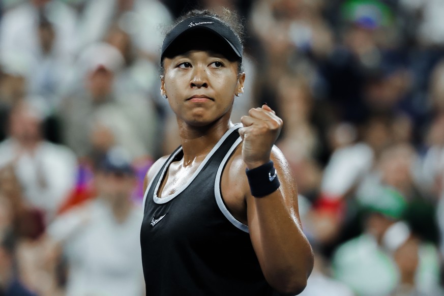 epa13216200 Naomi Osaka of Japan reacts during her match against Elise Mertens of Belgium during the Women's Singles third round of the US Open Tennis Championship in Flushing Meadows, New York,  ...