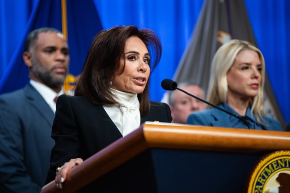 epa12570508 US Attorney for the District of Columbia Jeanine Pirro delivers remarks during a press conference at the Department of Justice in Washington, DC, USA, 04 December 2025. Federal officials h ...