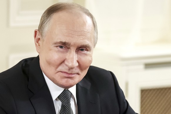 Russian President Vladimir Putin meets with the heads of international news agencies at the newly renovated St. Petersburg Rimsky-Korsakov State Conservatory on the sidelines of the St. Petersburg Int ...