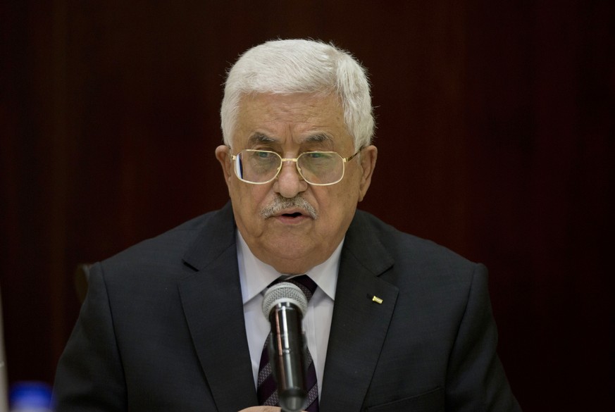 FILE - Palestinian President Mahmoud Abbas chairs the Palestine Liberation Organization (PLO) Executive Committee meeting at the Palestinian Authority headquarters, in the West Bank city of Ramallah, ...