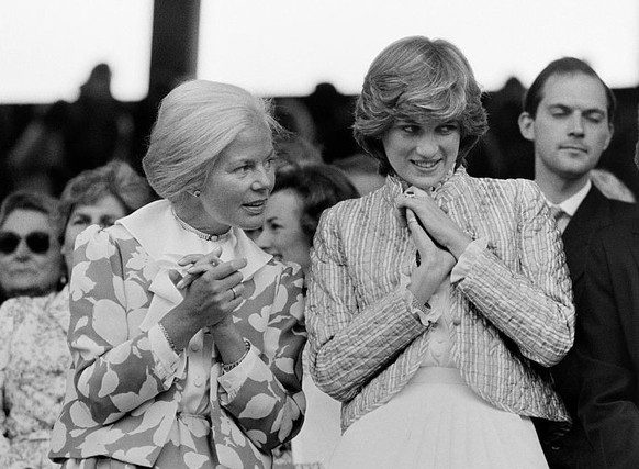 From left: Katharine Duchess of Kent, Lady Diana Spencer and her sister Lady Sarah McCorquodale (née Spencer) stand with their hands clasped while attending the Women&#039;s Final at the Wimbledon Cha ...