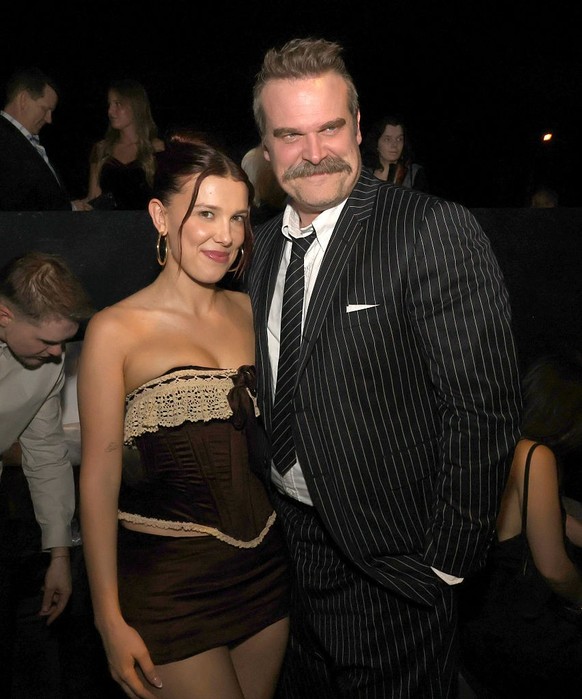 HOLLYWOOD, CALIFORNIA - NOVEMBER 06: Millie Bobby Brown (L) and David Harbour attend the after party for the Los Angeles Premiere of Netflix's "Stranger Things" Season 5 on November 06, ...