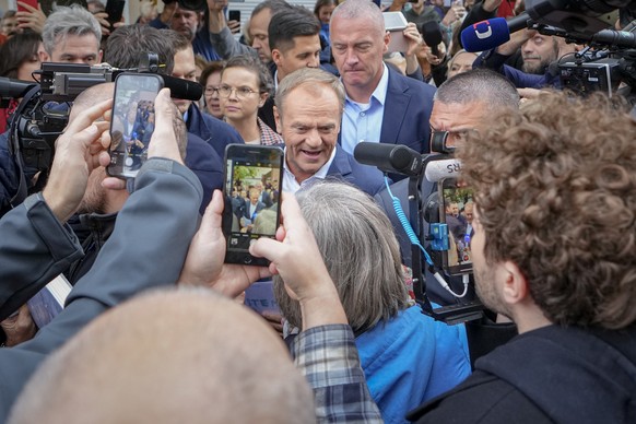 Poland&#039;s main opposition leader Donald Tusk smiles after casting his ballot during parliamentary elections in Warsaw, Poland, Sunday, Oct. 15, 2023. The outcome of Sunday&#039;s election will det ...