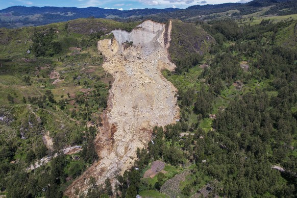 This photo released by UNDP Papua New Guinea, shows a landslide in Yambali village, in the Highlands of Papua New Guinea, Monday, May 27, 2024. Authorities fear a second landslide and a disease outbre ...