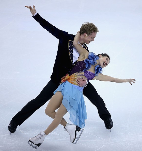 SHANGHAI, CHINA - NOVEMBER 02: Madison Chock and Evan Bates of United States skate in Ice Dance Short Dance during Cup of China ISU Grand Prix of Figure Skating 2012 at the Oriental Sports Center on N ...
