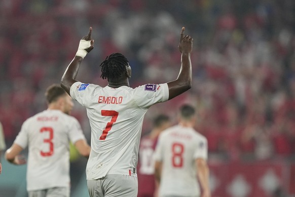 Switzerland's Breel Embolo celebrates after scoring his side's second goal during the World Cup group G soccer match between Serbia and Switzerland, at the Stadium 974 in Doha, Qatar, Friday ...