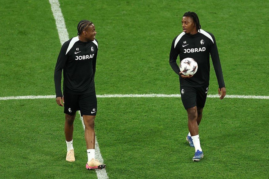 ISTANBUL, TURKEY - MAY 19: Bruno Ogbus and Johan Manzambi of Sport-Club Freiburg interact during the training session one day ahead of the UEFA Europa League Final 2026 between SC Freiburg and Aston V ...