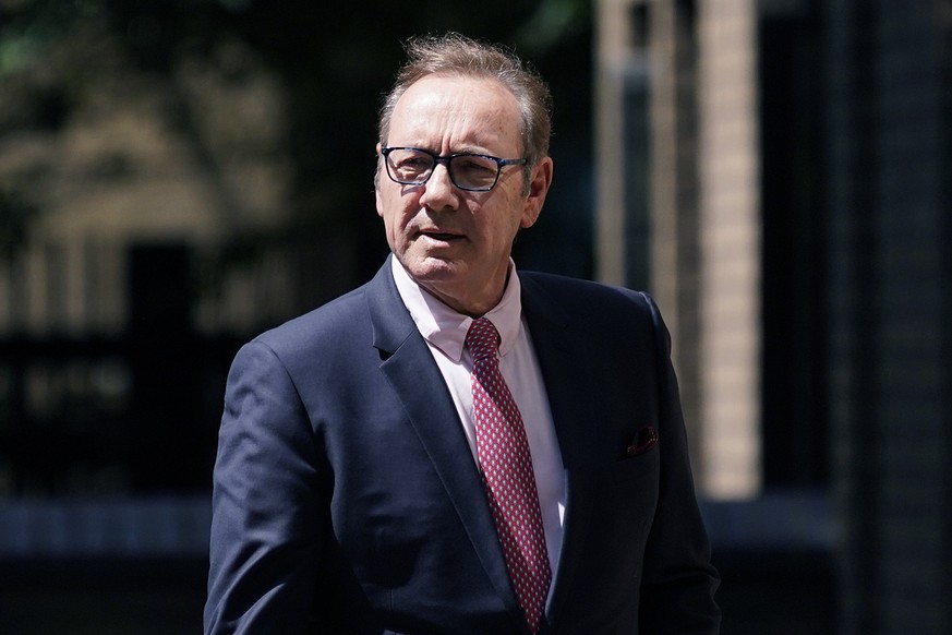 Actor Kevin Spacey walks outside Southwark Crown Court in London, Wednesday, July 26, 2023. The Jury continues deliberations in the trial of Kevin Spacey. The Hollywood star, 63, denies nine charges i ...