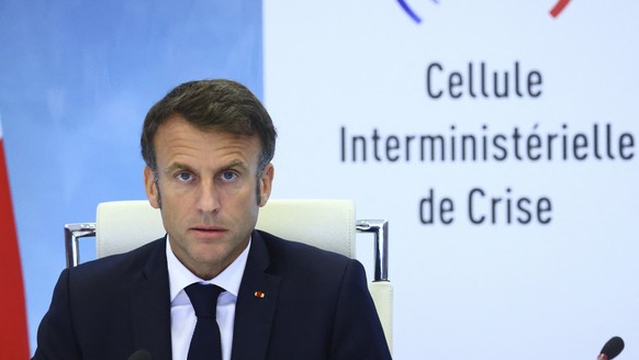 French President Emmanuel Macron speaks following a government emergency meeting after riots erupted for the third night in a row across the country, at the Interior Ministry in Paris, Friday, June 30 ...
