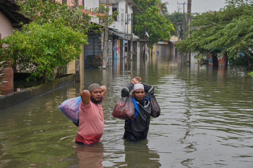 FILE - People wade through floodwaters in Colombo, Sri Lanka, Nov. 29, 2025. (AP Photo/Eranga Jayawardena, File)
Pictures of the Week Global Photo Gallery