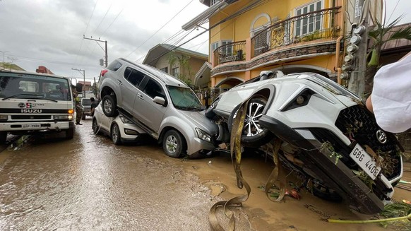 Vehicles lie piled on after flooding caused by Typhoon Kalmaegi in Cebu city, central Philippines, Tuesday, Nov. 4, 2025. (AP Photo/Jacqueline Hernandez)
Philippines Extreme Weather Asia Typhoon