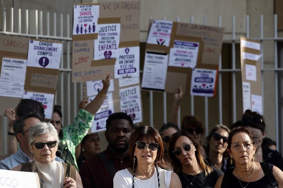 epa13024912 People attend a protest in front of the court house of Montpellier, Southern France, 08 June 2026. Several feminist and child advocacy organisations have called for demonstrations to prote ...