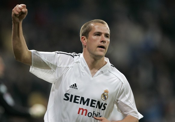 English Real Madrid player Michael Owen celebrates his goal during his Spanish league soccer match against Betis in Madrid, Wednesday, March 2, 2005. (AP Photo/Jasper Juinen) ** EFE OUT **