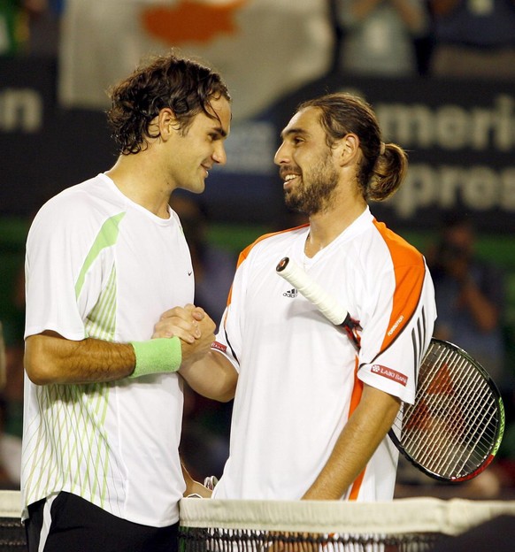 Marcos Baghdatis tout sourire malgré sa défaite en quatre manches contre Roger Federer en finale.  