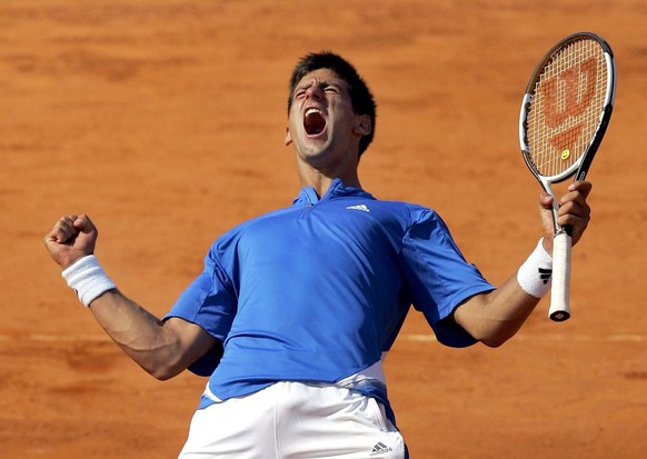 Serbia&#039;s Novak Djokovic celebrates after winning his Estoril Open first round tennis match against Russia&#039;s Igor Andreev Monday, April 30, 2007, in Oeiras, outside Lisbon, Portugal. Djokovic ...