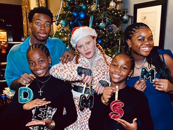 Genre pas comme Madonna éclatée avec ses kids en 2022.