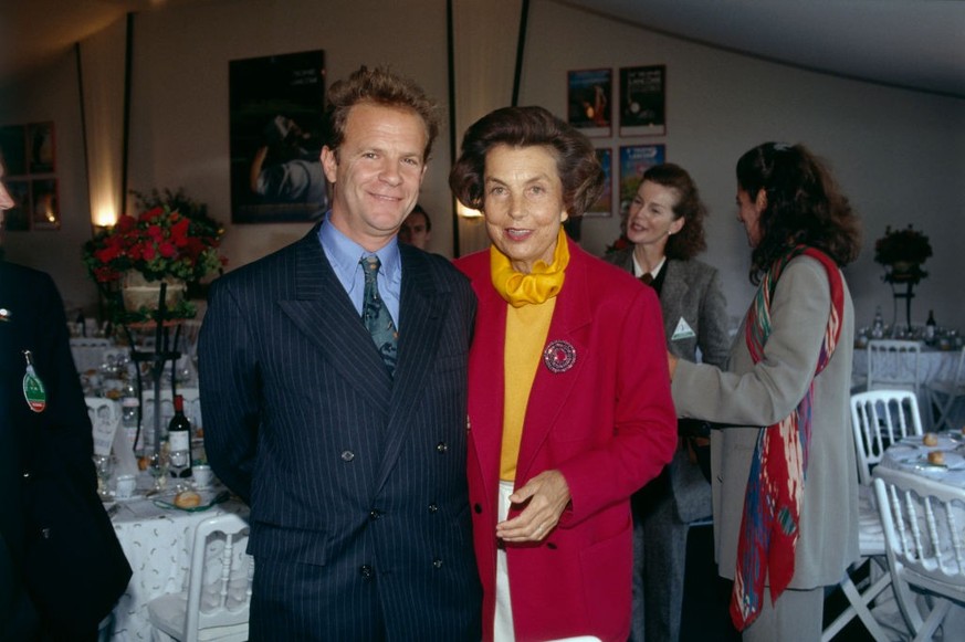 Lancome CEO Liliane Bettencourt and photographer François Marie Banier attend theTrophy 1992 Ceremony which is held at the golf course of Saint Nom la Breteche. (Photo by Eric Robert/Sygma/Sygma via G ...