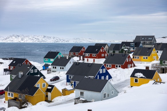 A general view of a residential area of Nuuk, Greenland, on March 10, 2025, on the eve of Greenland, the autonomous Danish territory legislative elections. Two days of storm and mild weather has rippe ...