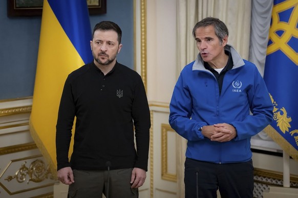 epa11875324 A handout photo made available by the Presidential Press Service shows IAEA Director General Rafael Grossi (R) and Ukrainian President Volodymyr Zelensky (L) meeting in Kyiv, Ukraine, 04 F ...