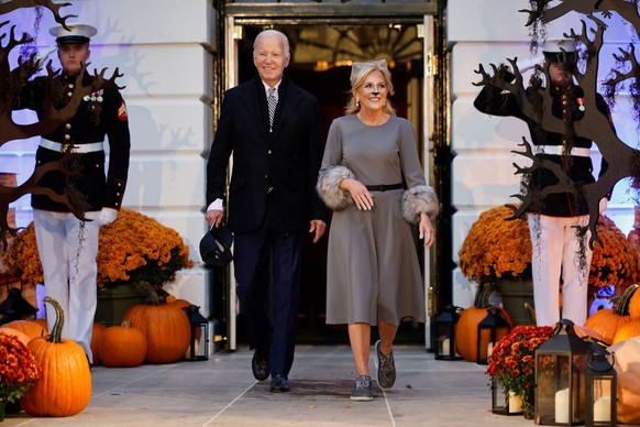 WASHINGTON, DC - OCTOBER 30: U.S. President Joe Biden and first lady Jill Biden walk out of the White House to host a Halloween event on the South Lawn of the White House on October 30, 2023 in Washin ...