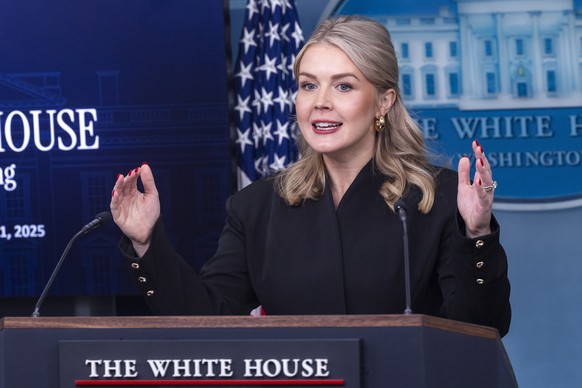 epa12585723 White House Press Secretary Karoline Leavitt responds to a question from the news media during the daily press briefing at the White House in Washington, DC, USA, 11 December 2025. Secreta ...