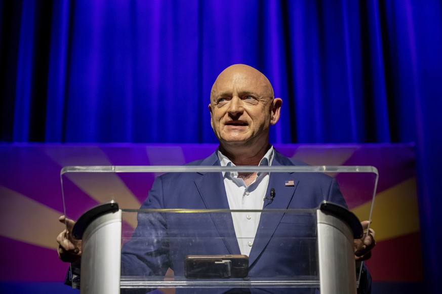 Sen. Mark Kelly, D-Ariz., addresses supporters at an election night event in Tucson, Ariz., Tuesday, Nov. 8, 2022. (AP Photo/Alberto Mariani)