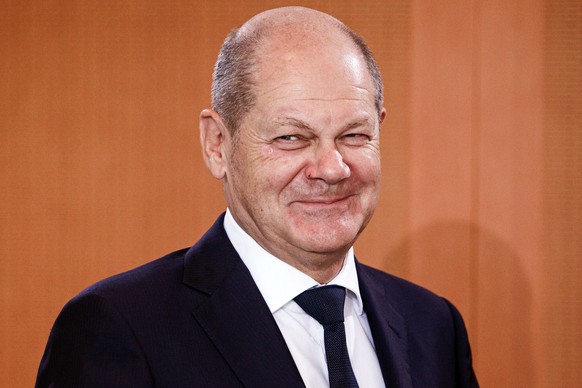 epa10858135 German Chancellor Olaf Scholz looks on during a German government cabinet meeting in Berlin, Germany, 13 September 2023. The cabinet meeting of the German government was attended by French ...