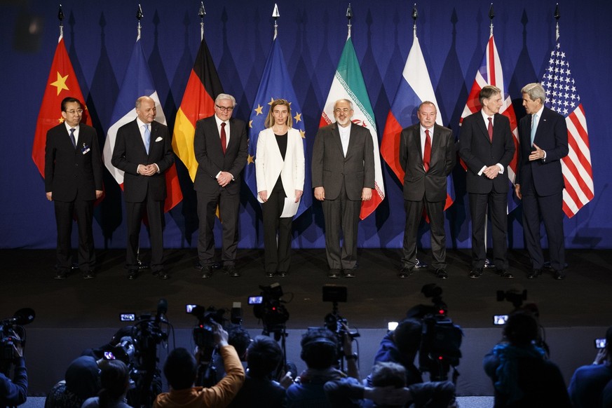 From left to right, the Chinese representative, French Foreign Minister Laurent Fabius, German Minister of Foreign Affairs Frank-Walter Steinmeier, High Representative of the European Union for Foreig ...