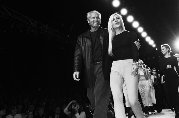 NEW YORK - MARCH 1996: Fashion designers Gianni Versace (1946 -1997) and Donatella Versace on the runway after a Versace fashion show in March 1996 in New York City, New York. (Photo by Catherine McGa ...