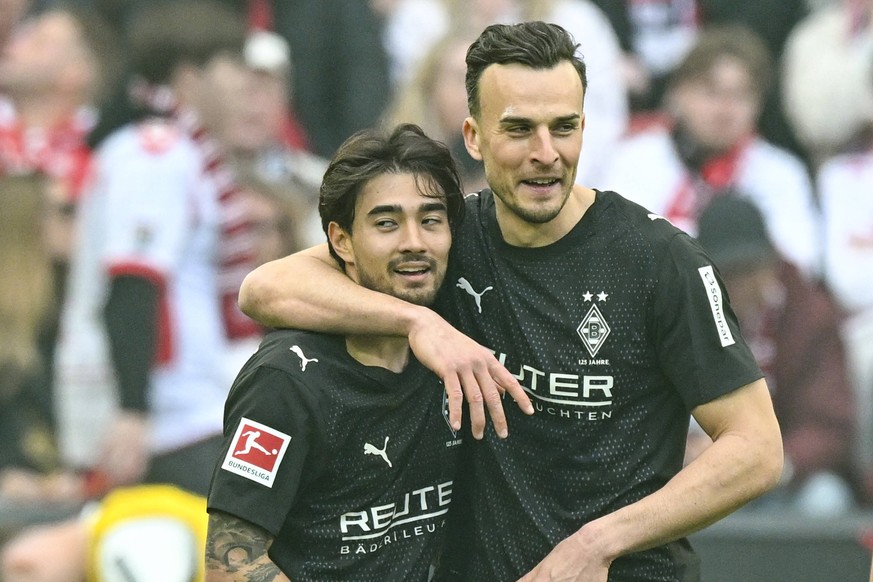 Jens Castrop Moenchengladbach 17 jubelt nach dem Tor zum 2:3 mit Haris Tabakovic Moenchengladbach 15 21.03.2026 Fussball 1. FC Koeln vs Borussia Moenchengladbach, Rheinenergiestadion, Koeln, DFB/DFL R ...