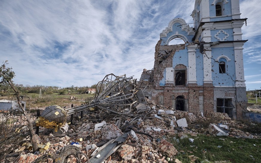 epa10252850 Destroyed church, which is part of Sviatohirsk Lavra, in the Bohorodychne village of Donetsk area, Ukraine, 19 October 2022 amid the Russian invasion. Bohorodychne village was captured by ...