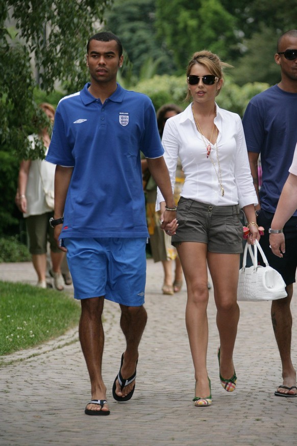 Mandatory Credit: Photo by Mark Large/ANL/Shutterstock 3432142a Ashley Cole With His Girlfriend Cheryl Tweedy In Baden-baden Germany During The 2006 Football World Cup. Cheryl Married Ashley On The 15 ...