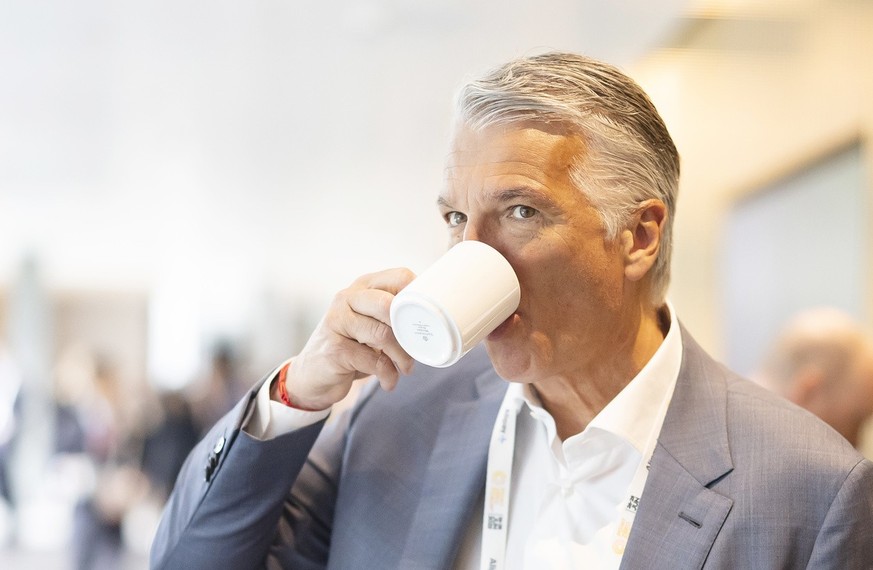 Group Chief Executive Officer of Swiss Bank UBS Sergio P. Ermotti drinks a coffee as he attends the Point Zero Forum at the Circle in Zurich, Switzerland on Tuesday June 27, 2023. (KEYSTONE/Michael Bu ...