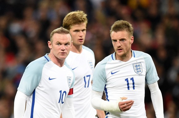 epa05342927 England&#039;s Wayne Rooney (L) Eric Dier (C) and Jamie Vardy (R) in action against Portugal during International friendly soccer match England vs Portugal ahead of the UEFA EURO 2016 at W ...