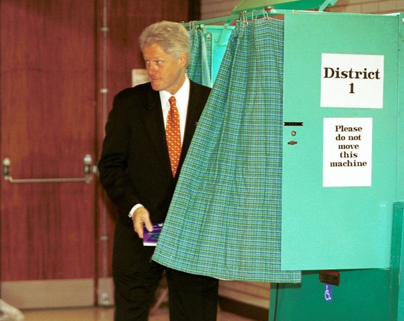 383498 01: President Bill Clinton leaves the voting booth at Grafflin Elementary School on election day November 7, 2000 in Chappaqua, New York. (Photo by Cynthia Johnson/Liaison)
