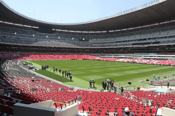 epa12854959 People work inside the Azteca stadium in Mexico City, Mexico, 27 March 2026. Pele and Maradona became world champions at the Azteca stadium, which will open its doors following a major ren ...