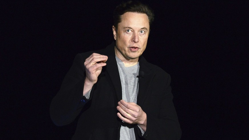 FILE - SpaceX&#039;s Elon Musk provides an update on Starship, Thursday, Feb. 10, 2022, near Brownsville, Texas. Musk is daring the United Auto Workers union to hold an organizing vote at Tesla