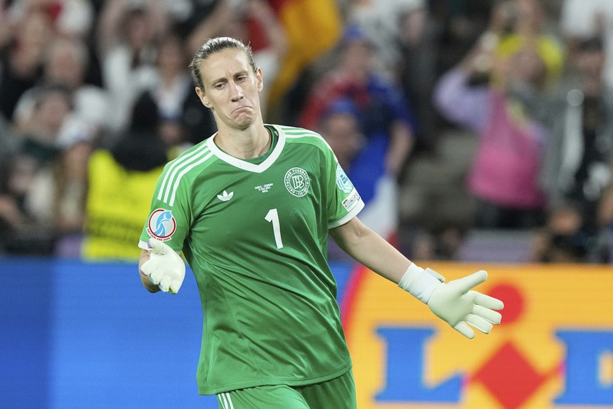 Germany goalkeeper Ann-Katrin Berger reacts after scoring during a penalty shootout during the Women&#039;s Euro 2025 quarterfinals soccer match between France and Germany at St. Jakob-Park in Basel,  ...