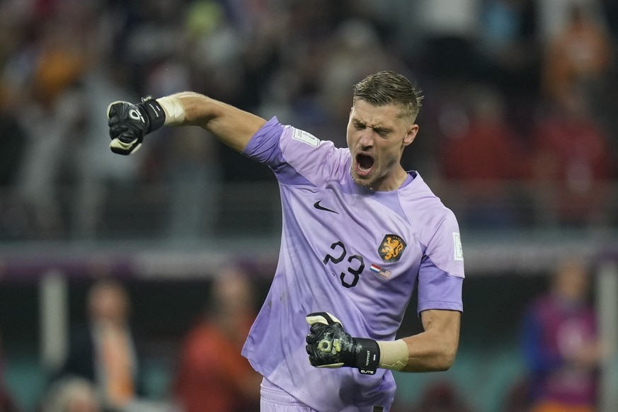 goalkeeper Andries Noppert of the Netherlands celebrates at the end of the World Cup round of 16 soccer match between the Netherlands and the United States, at the Khalifa International Stadium in Doh ...