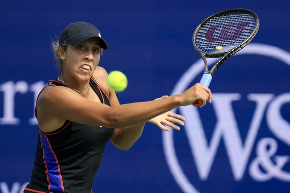 Madison Keys, of the United States, returns a shot to Petra Kvitova, of the Czech Republic, during the Western &amp; Southern Open tennis tournament, Saturday, Aug. 20, 2022, in Mason, Ohio. (AP Photo ...