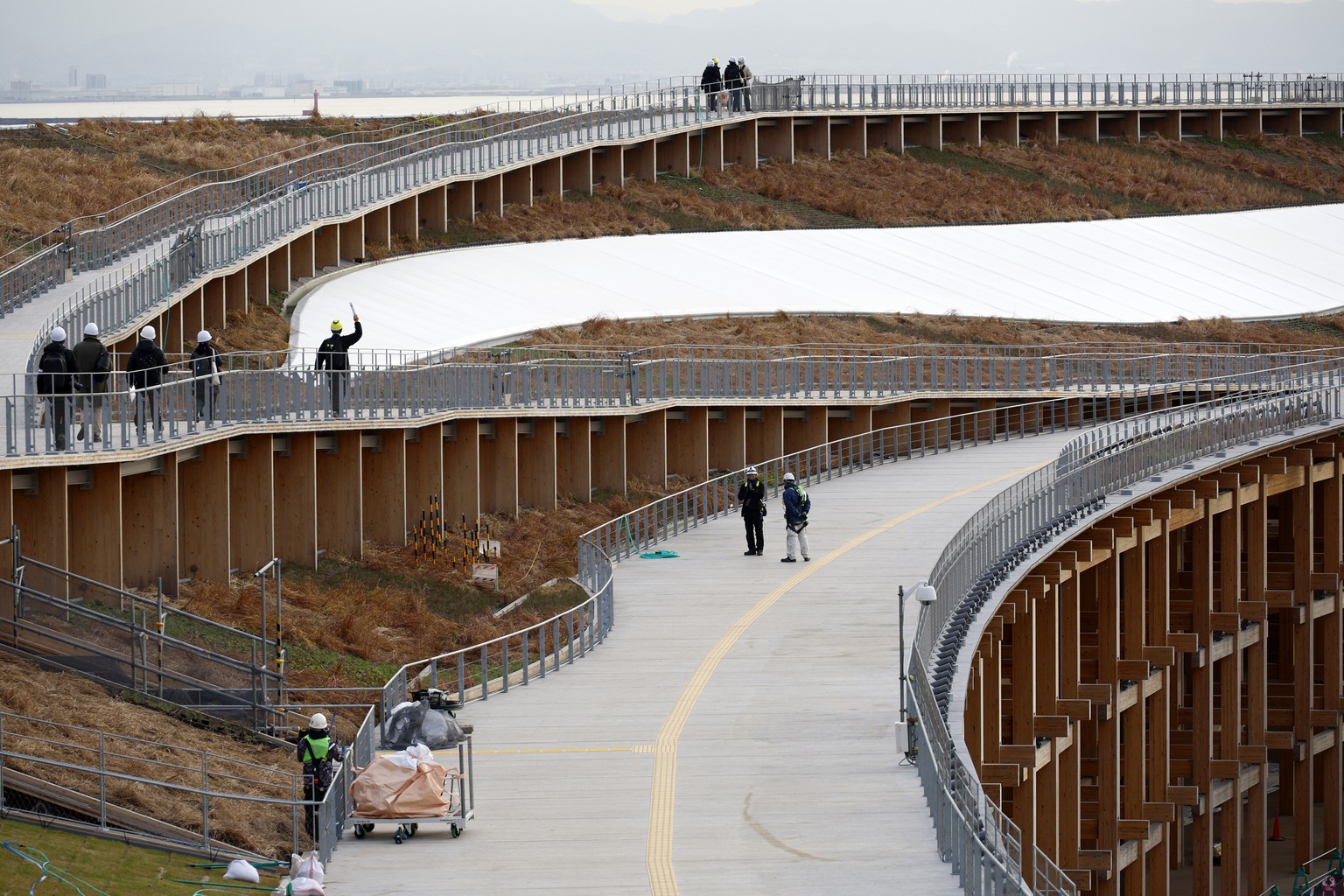 epa11787079 Media members visit the ?Grand Ring? during a press tour at the site of the Expo 2025 Osaka Kansai in Osaka, western Japan, 20 December 2024. With less than four months to go until the ope ...
