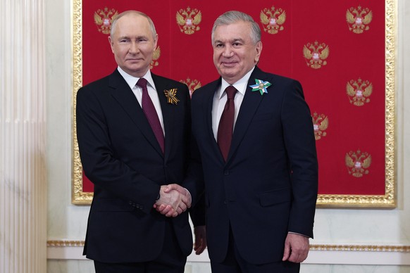 Mirzioïev avec Poutine en mai 2023.