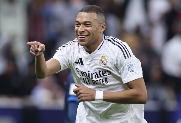 epa11784409 Kylian Mbappe of Real Madrid celebrates after scoring during the FIFA Intercontinental Cup 2024 final match between Real Madrid and Pachuca in Lusail, Qatar, 18 December 2024. EPA/NOUSHAD  ...