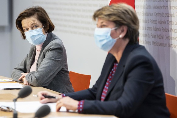 Swiss Federal Councilor Viola Amherd, right, and Florence Parly, Defense Minister of France, left, speak while a press conference during an official working visit, in Bern, Switzerland, on Monday, Mar ...