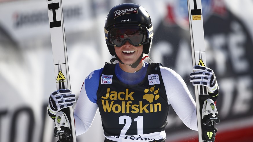 Lara Gut reacts at the finish area after completing the downhill portion of an alpine ski, women&amp;#039;s supercombined, in Val D&amp;#039;Isere, France, Friday, Dec. 18, 2015. (AP Photo/Giovanni Au ...