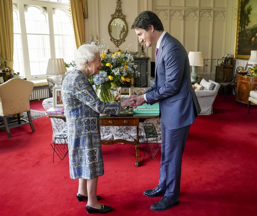 Britain&#039;s Queen Elizabeth II receives Canada&#039;s Prime Minister Justin Trudeau during an audience at Windsor Castle, Windsor, England, Monday March 7, 2022. (Steve Parsons/Pool via AP)