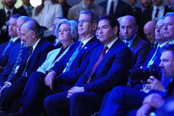 United States Secretary of State Marco Rubio, center, right, sits with U.S. Treasury Secretary Scott Bessent, center, and White House chief of staff Susie Wiles, center left, as they listen to the add ...