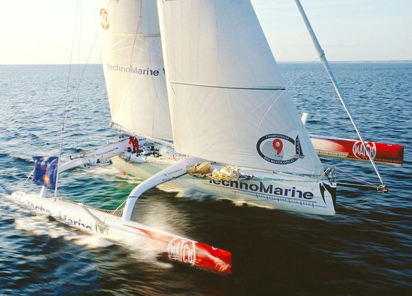 Swiss yachtsman Steve Ravussin steers his trimaran TechnoMarine during training for the Route du Rhum transatlantic solo sailing race, in this undated but recent photo. Ravussin was leading the race w ...